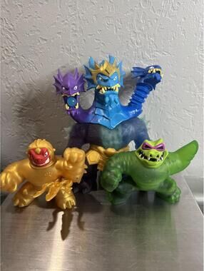 3 heroes of Goo Jit Zu Figures Golden Blazagon,Deep Sea King Hydra,and Rock Jaw